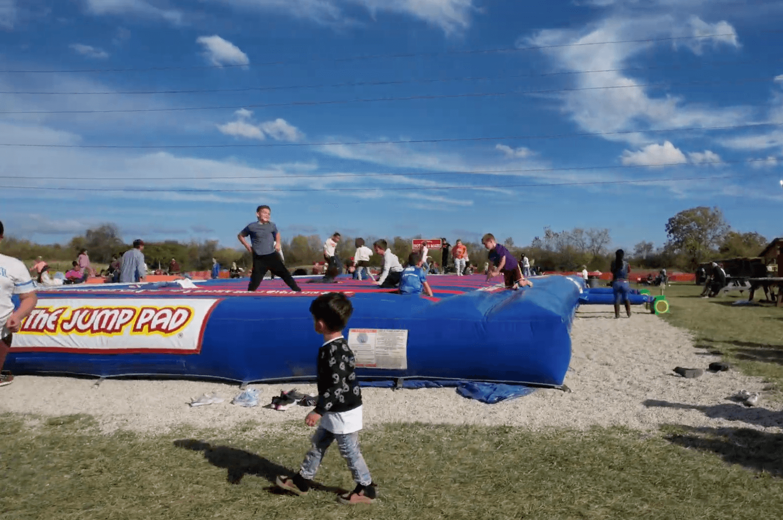 Kids bouncing on the Jump Pad